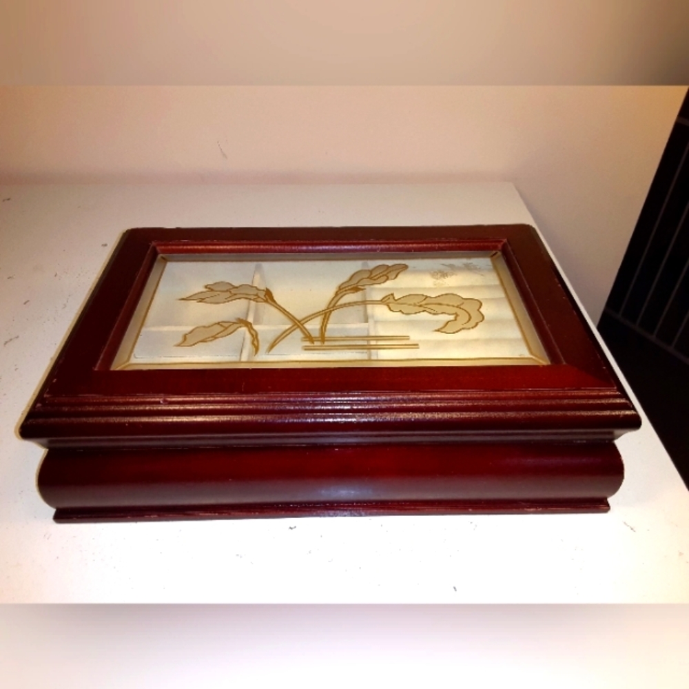 Wooden jewelry box with glass lid